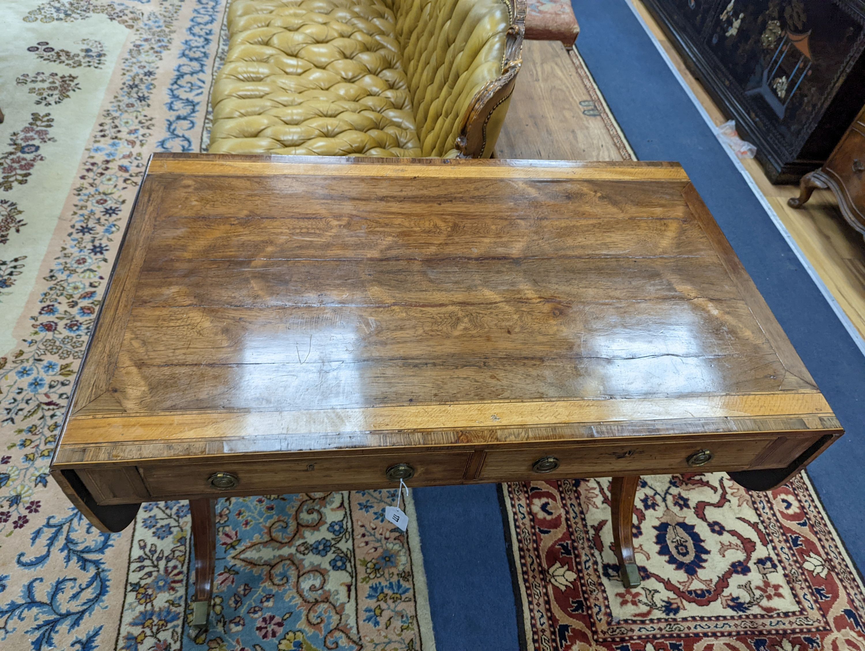 A Regency satinwood banded rosewood sofa table, width 101cm, depth 60cm, height 74cm